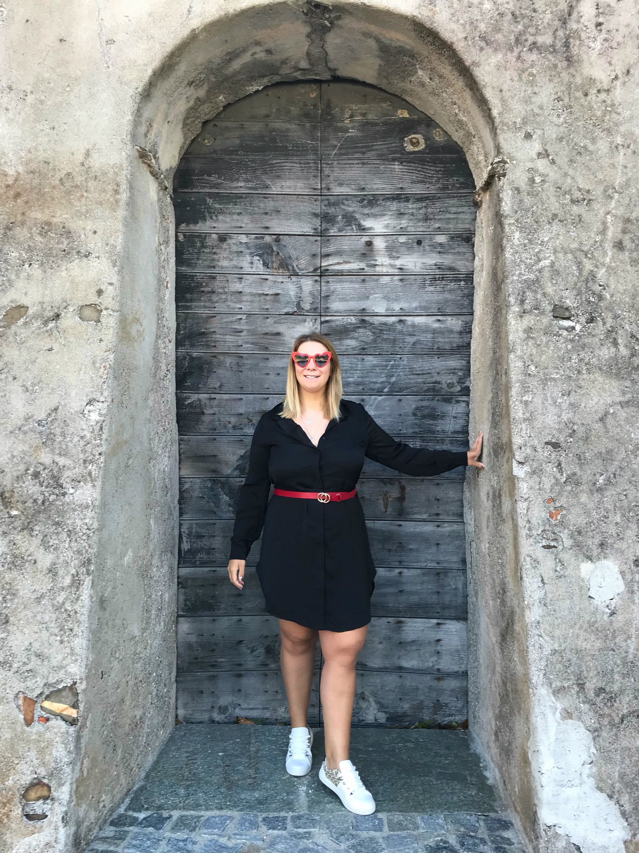 Black shirt dress with animal print trainers