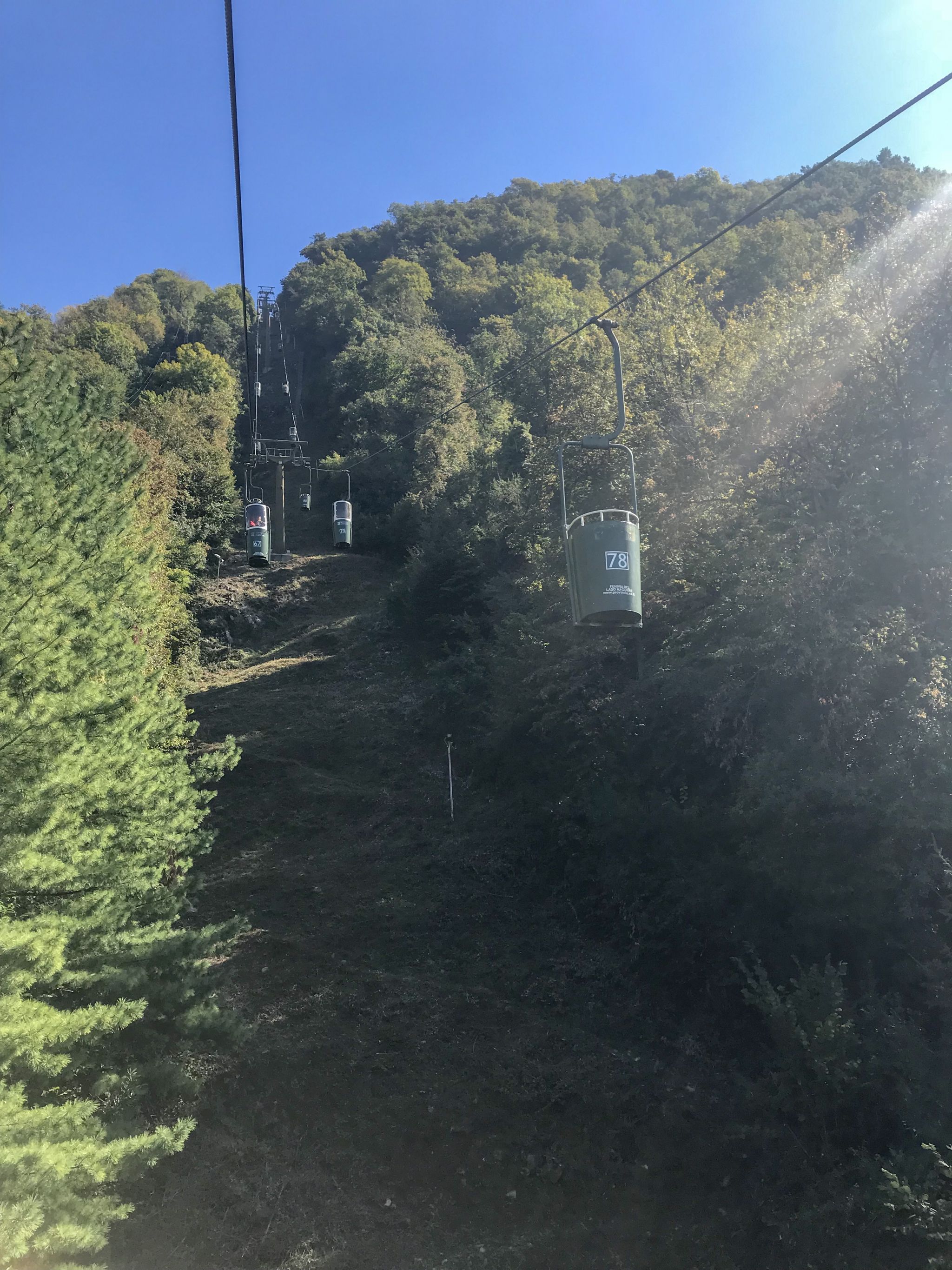 climbing up in bucket lifts of lake maggiore italy